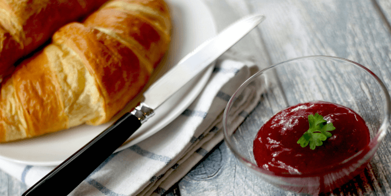 Photo of a shampoo bottle in a woman's hands